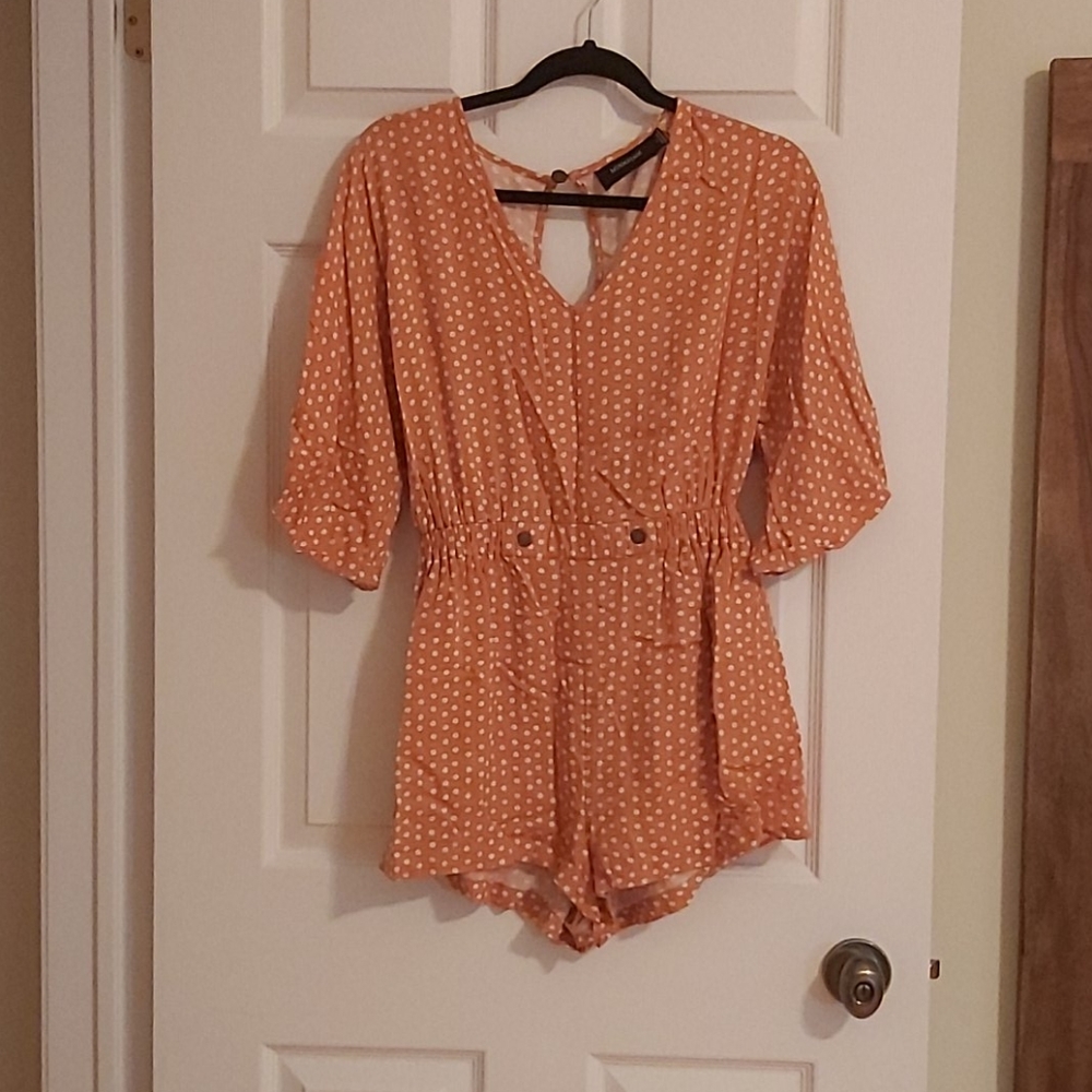 Orange polka dotted romper